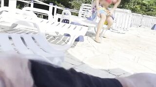 She noticed that I was jerking off and helped me cum right next to the public pool