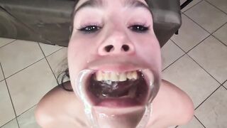 Human toilet drinking and gargling piss with a lip retractor