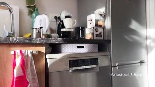 Sunny morning and she is making coffee in stokings and hills. Voyeurism.